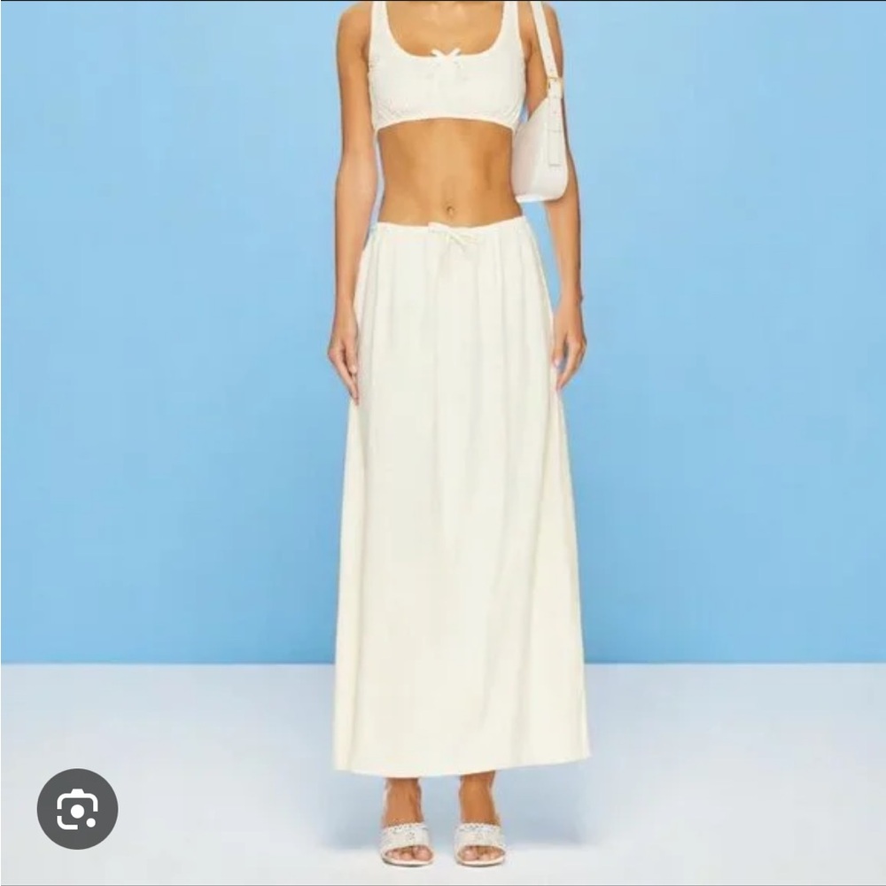 We wore what matching set NWT. consists of the waist skirt and scrunchy top. XS